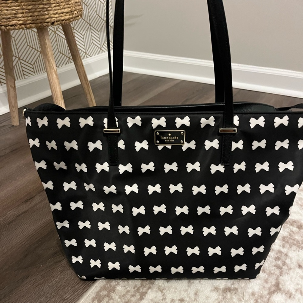 Kate Spade bow diaper bag. Only used a few times and in excellent condition.